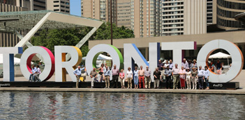 group photo at TORONTO sign