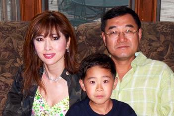 Peter Kim with his wife Jennifer and son William