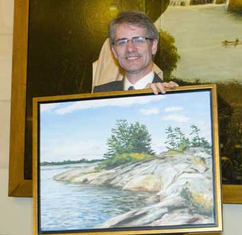 Ben Alman with painting